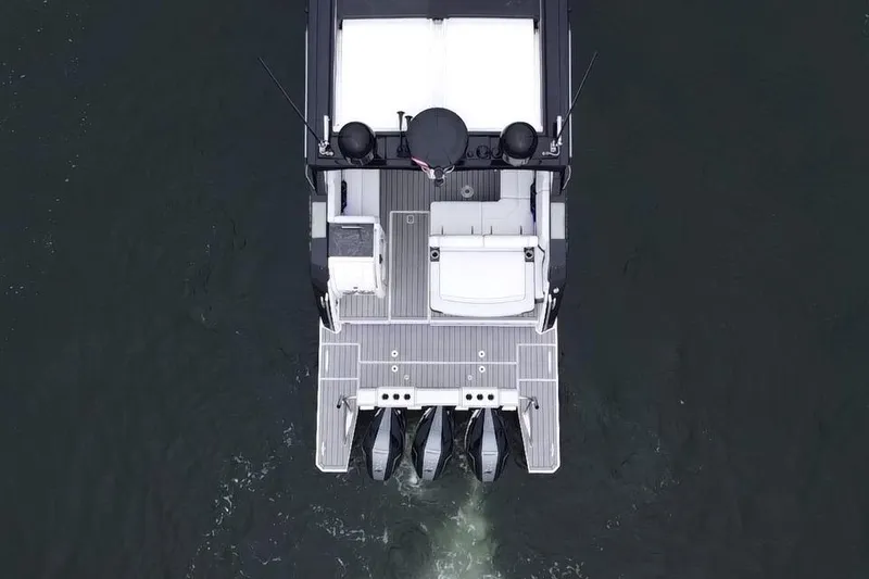 Slide: The Image of Overhead view of 2022 Formula 380 Super Sport Crossover OB on water. - 28