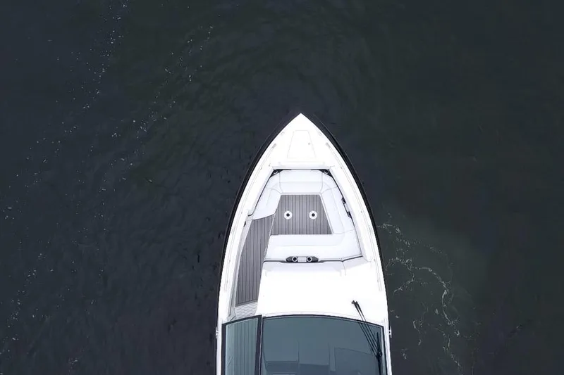 Slide: The Image of Aerial view of 2022 Formula 380 Super Sport Crossover OB boat on dark water. - 29