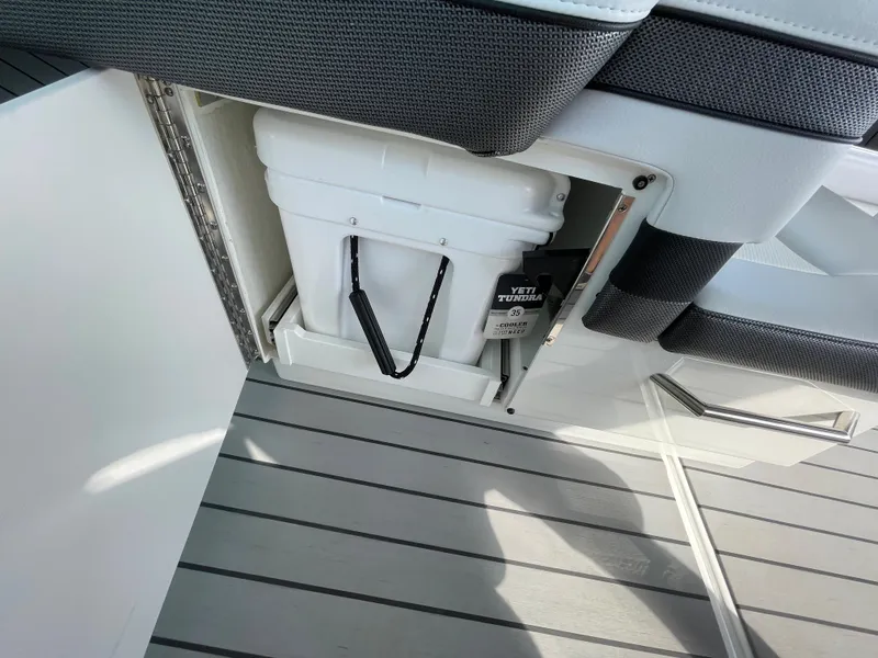 Slide: The Image of 2022 Formula 380 Super Sport Crossover storage compartment with a Yeti cooler. - 30