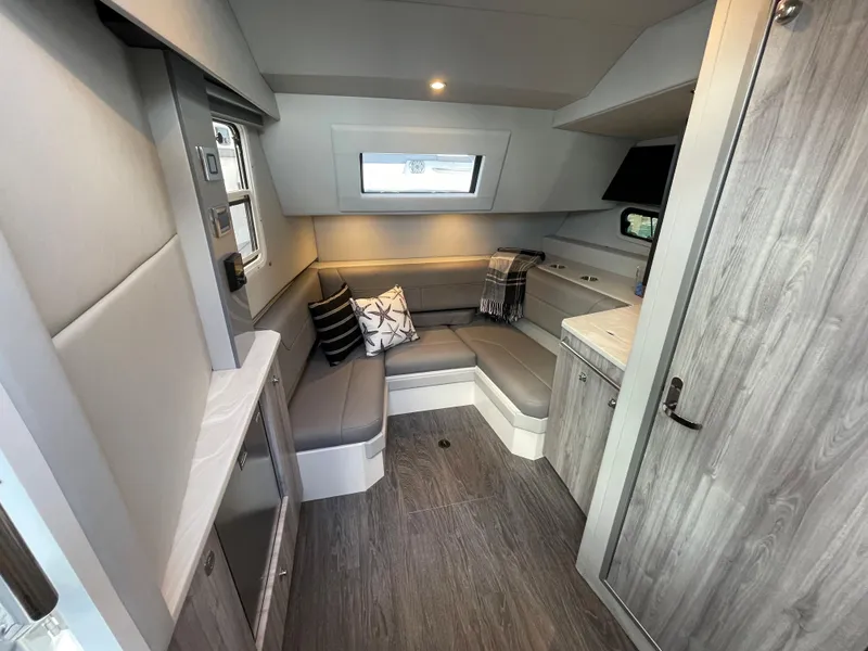 Slide: The Image of 2022 Formula 380 Super Sport Crossover OB interior with modern seating and cabinetry. - 37