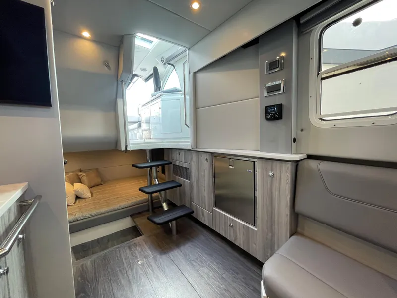 Slide: The Image of Interior of 2022 Formula 380 Super Sport Crossover OB, featuring modern design and cozy seating. - 40