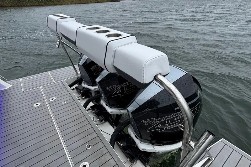 Slide: The Image of 2022 Formula 380 Super Sport Crossover OB with powerful outboard engines on water. - 45