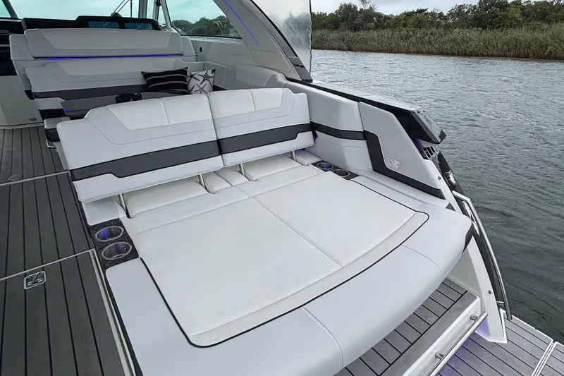 Slide: The Image of 2022 Formula 380 Super Sport Crossover OB with luxurious seating on deck. - 51