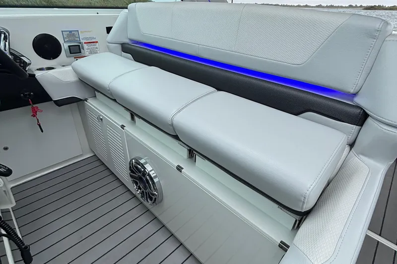 Slide: The Image of 2022 Formula 380 Super Sport Crossover OB interior with cushioned seating and blue LED lighting. - 67