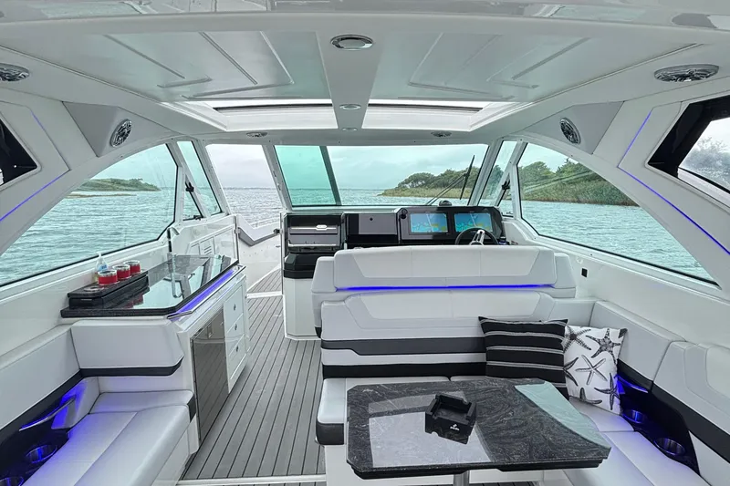 Slide: The Image of 2022 Formula 380 Super Sport Crossover OB interior with modern seating and navigation displays. - 69