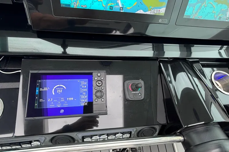 Slide: The Image of Dashboard of 2022 Formula 380 Super Sport Crossover OB with navigation and fuel displays. - 79