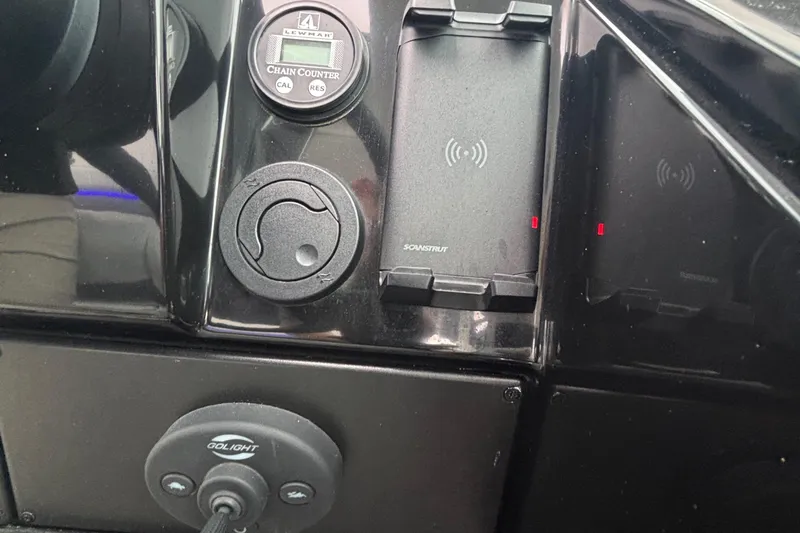 Slide: The Image of Control panel of 2022 Formula 380 Super Sport Crossover OB with chain counter and wireless charging. - 82