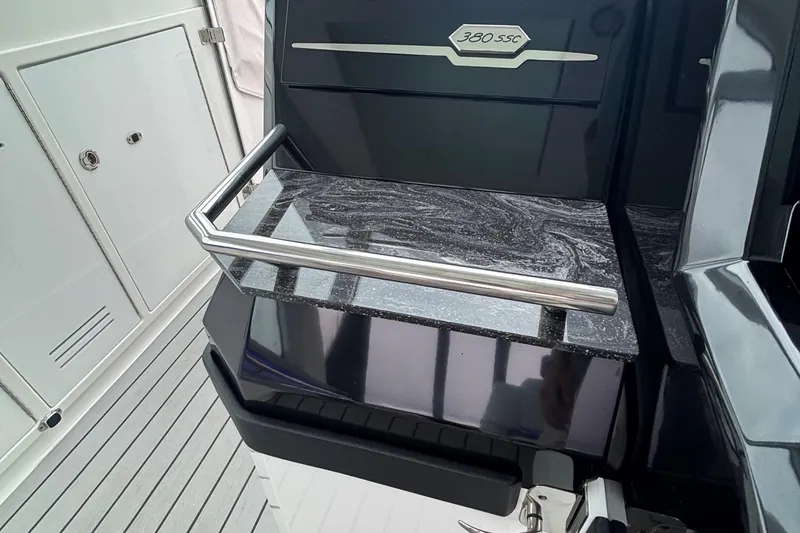 Slide: The Image of 2022 Formula 380 Super Sport Crossover OB interior detail with sleek countertop and stainless steel rail. - 84