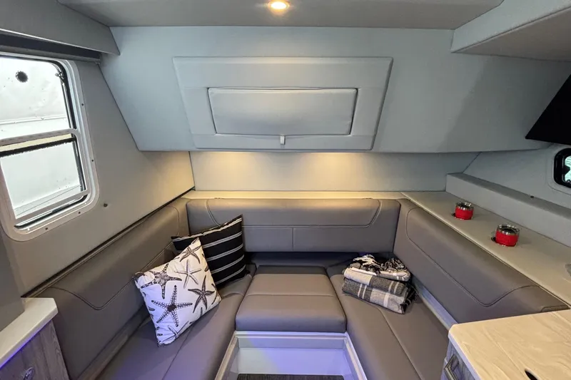 Slide: The Image of Interior of 2022 Formula 380 Super Sport Crossover OB with cozy seating and decorative pillows. - 85