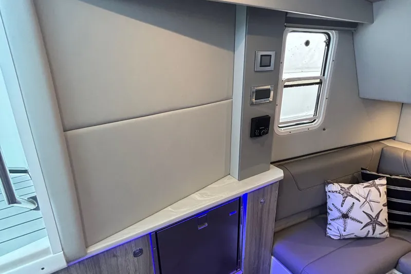 Slide: The Image of Interior of 2022 Formula 380 Super Sport Crossover OB, featuring modern design and starfish-themed decor. - 86