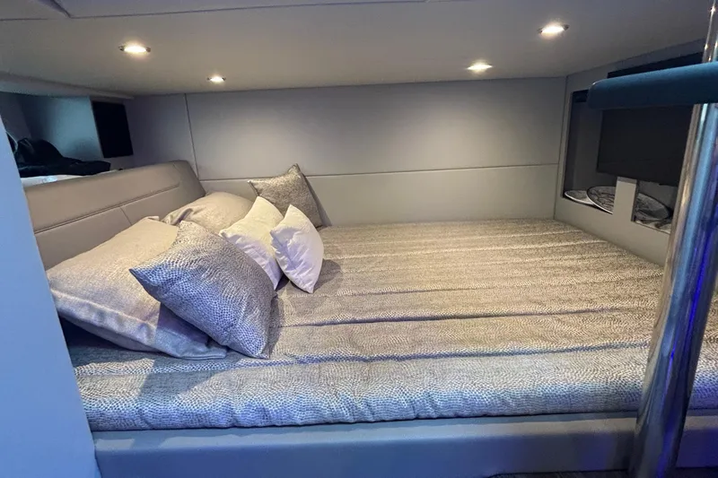 Slide: The Image of Luxurious cabin interior of 2022 Formula 380 Super Sport Crossover OB with plush bedding. - 89