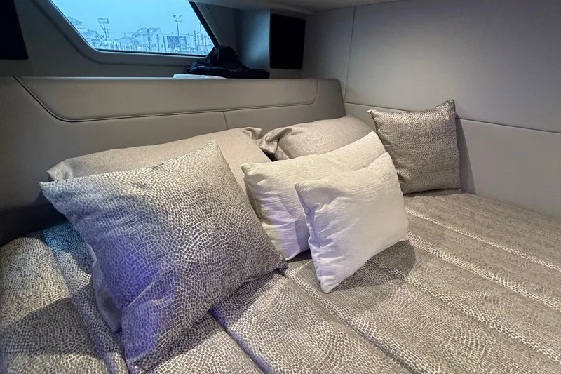 Slide: The Image of Interior cabin of 2022 Formula 380 Super Sport Crossover OB with plush pillows. - 90