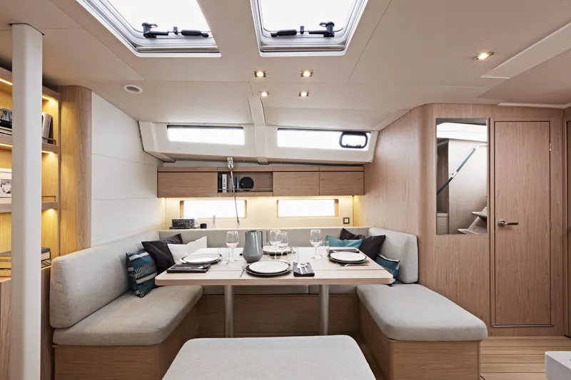 Slide: The Image of Modern interior of 2024 Beneteau Oceanis 46.1 sailboat with dining area. - 26