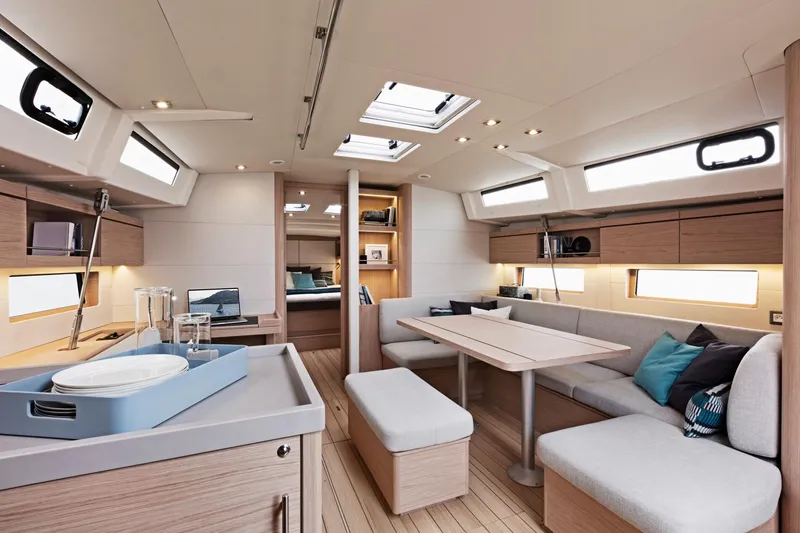 Slide: The Image of 2024 Beneteau Oceanis 46.1 yacht interior with modern design and spacious seating area. - 28
