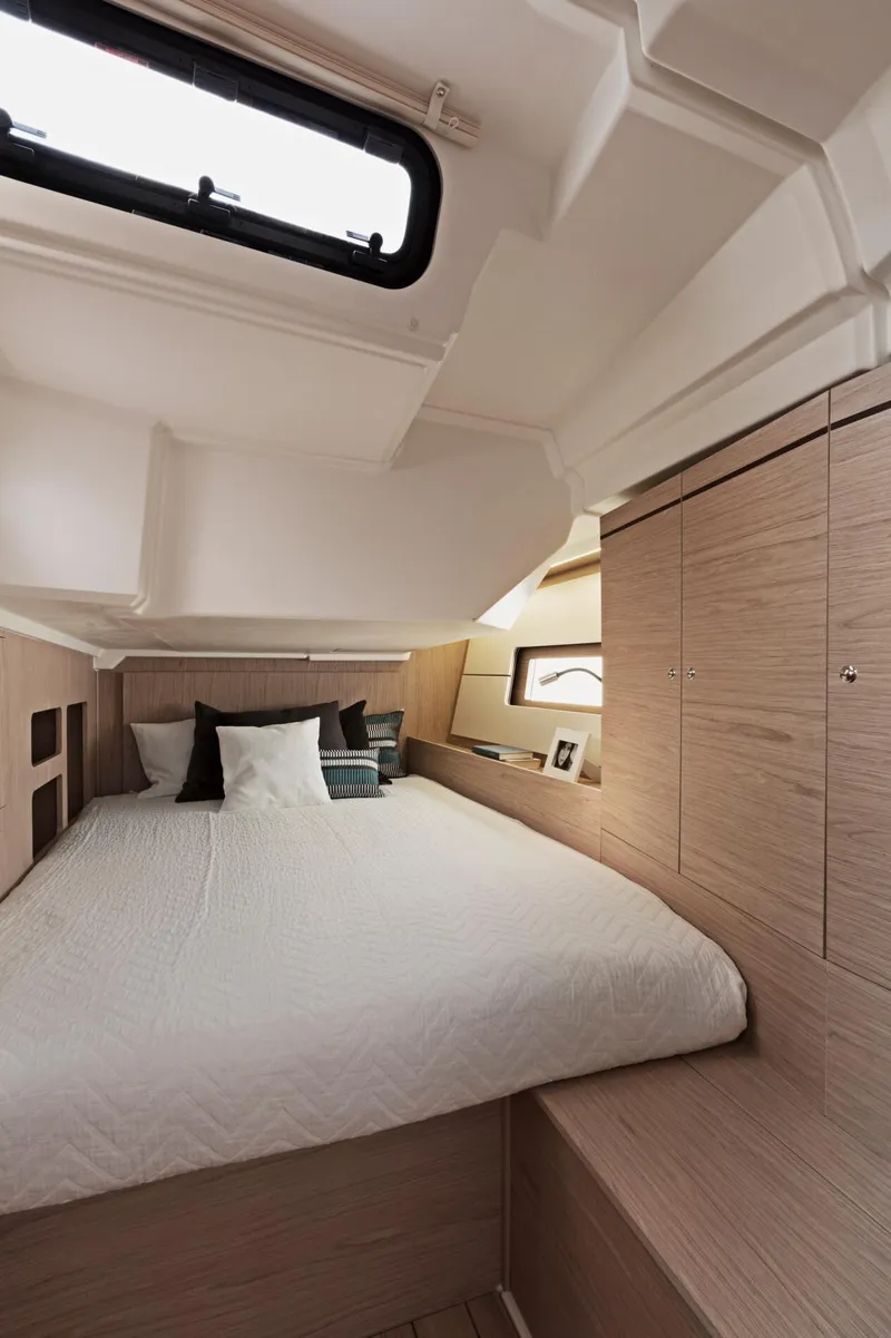 Slide: The Image of Luxurious bedroom interior of 2024 Beneteau Oceanis 46.1 yacht with modern design. - 30
