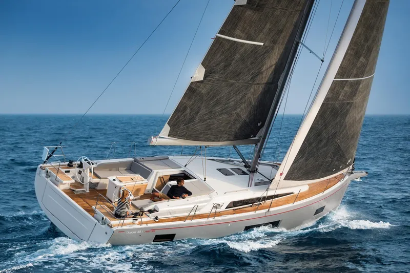 Slide: The Image of 2024 Beneteau Oceanis 46.1 sailing yacht on open water. - 8