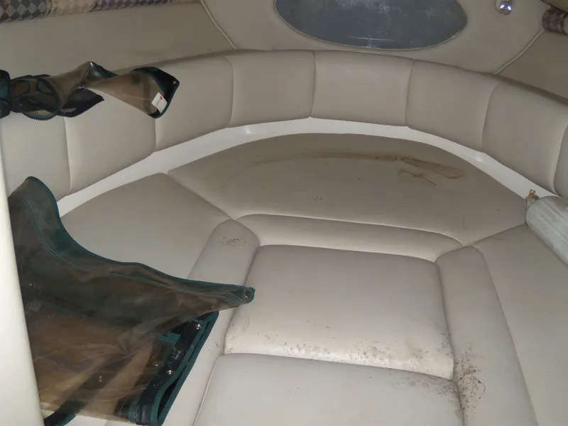 Slide: The Image of Interior cabin of 2000 Chaparral 235 SSi boat with beige seating. - 9