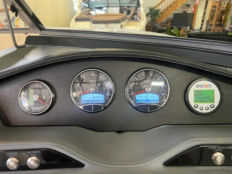 Slide: The Image of Dashboard of a 2016 Cobalt R5 WSS boat with gauges and controls. - 4