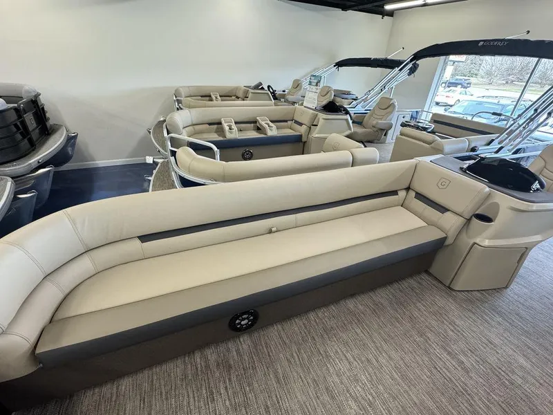 Slide: The Image of 2023 Godfrey SW 2486 SFL pontoon boat interior in showroom. - 2