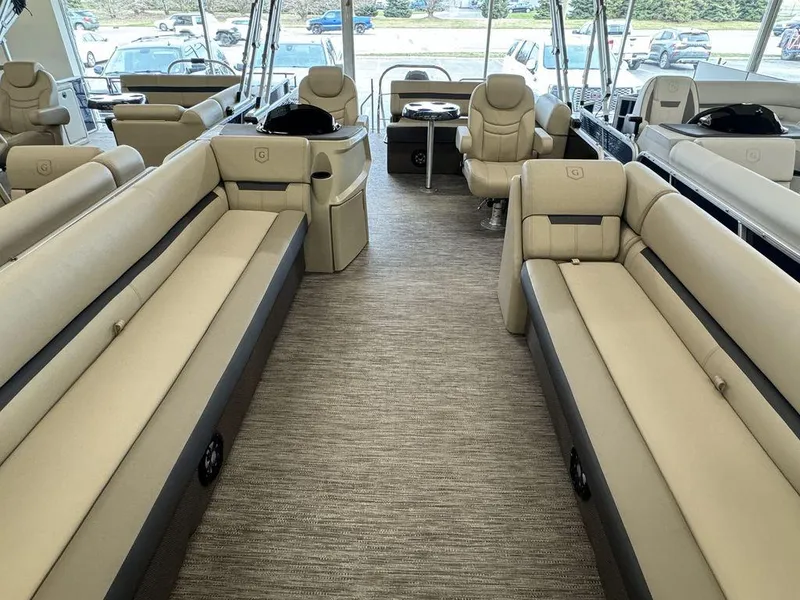 Slide: The Image of Interior of 2023 Godfrey SW 2486 SFL pontoon boat with beige seating. - 5