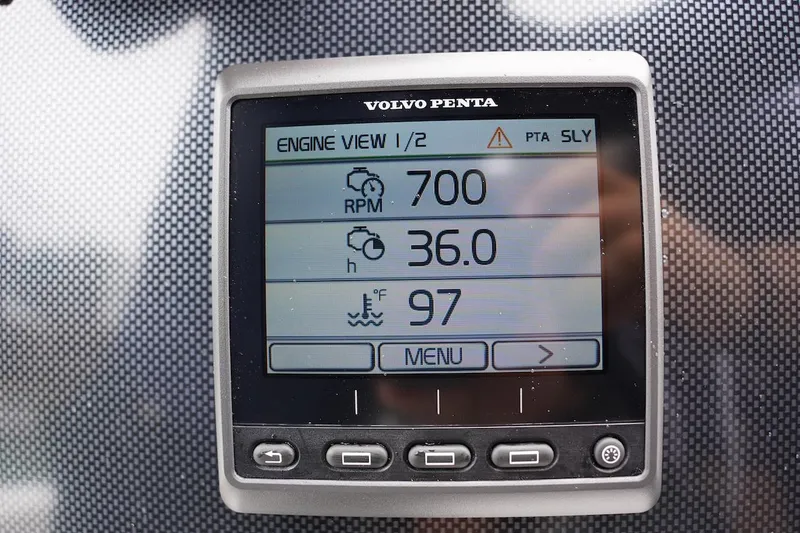 Slide: The Image of Volvo Penta engine display showing RPM, hours, and temperature on Novurania Chase 2020. - 14