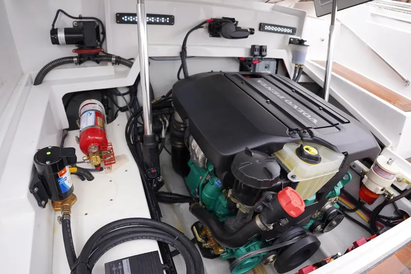 Slide: The Image of Engine compartment of a 2020 Novurania Chase boat, featuring a well-organized layout. - 29