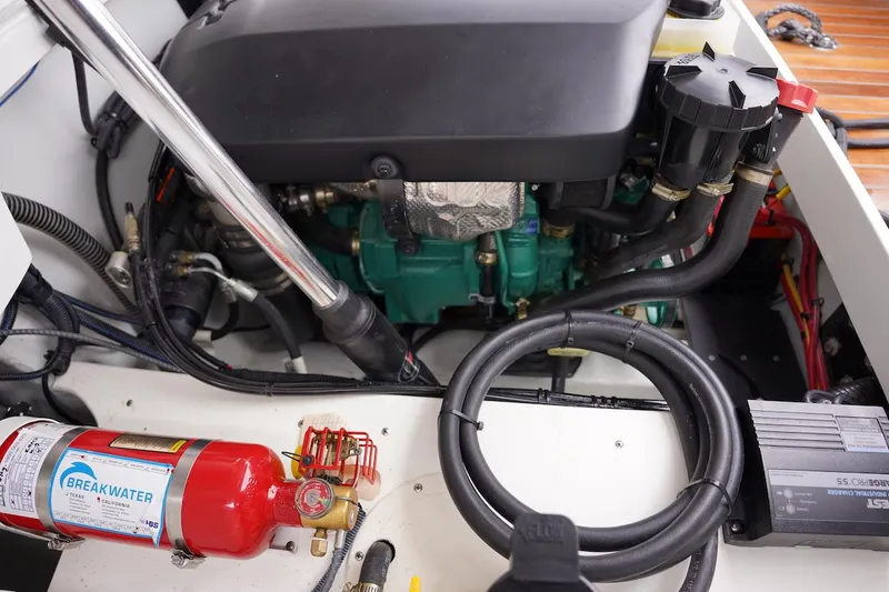 Slide: The Image of Engine compartment of a 2020 Novurania Chase boat with visible fire extinguisher. - 31