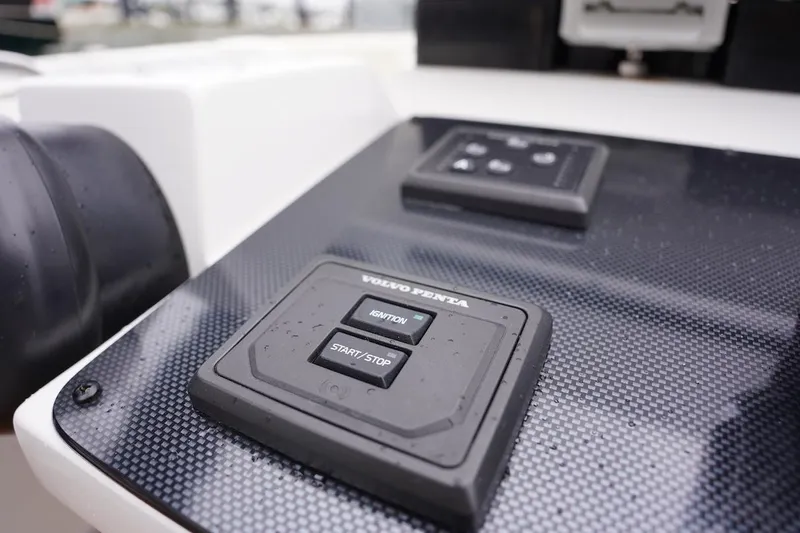 Slide: The Image of Control panel of a 2020 Novurania Chase boat with Volvo Penta buttons. - 39