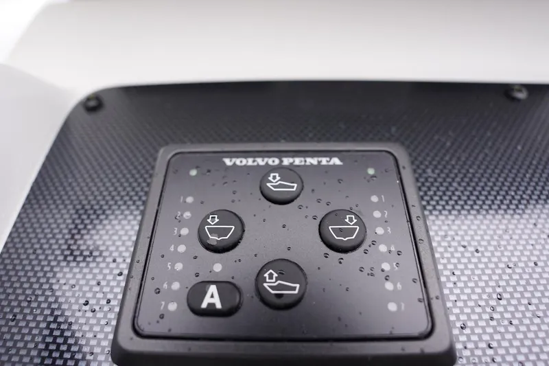 Slide: The Image of Volvo Penta control panel on 2020 Novurania Chase boat, featuring water droplets. - 40