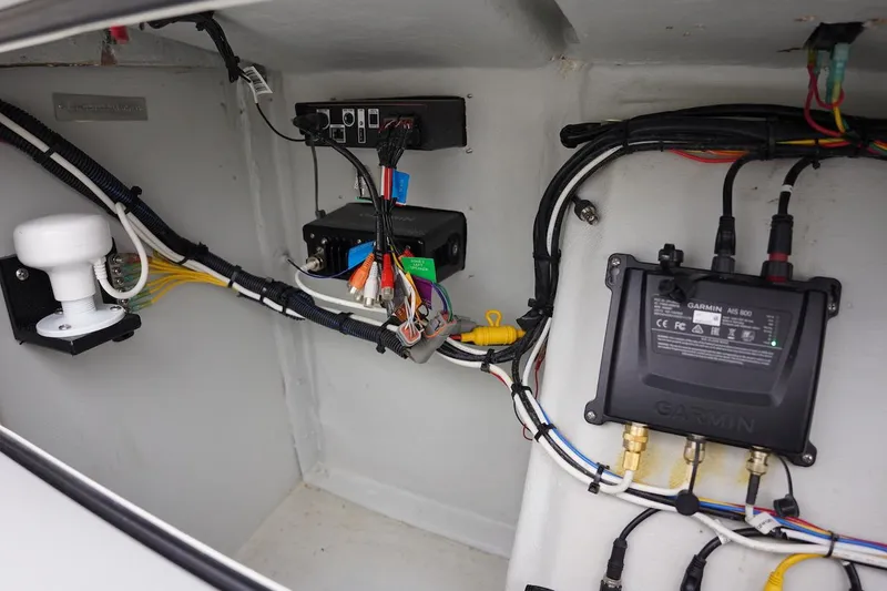 Slide: The Image of Electrical wiring and components inside a 2020 Novurania Chase boat. - 43