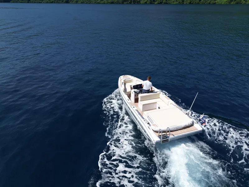 Slide: The Image of 2020 Novurania Chase boat cruising on open water. - 5