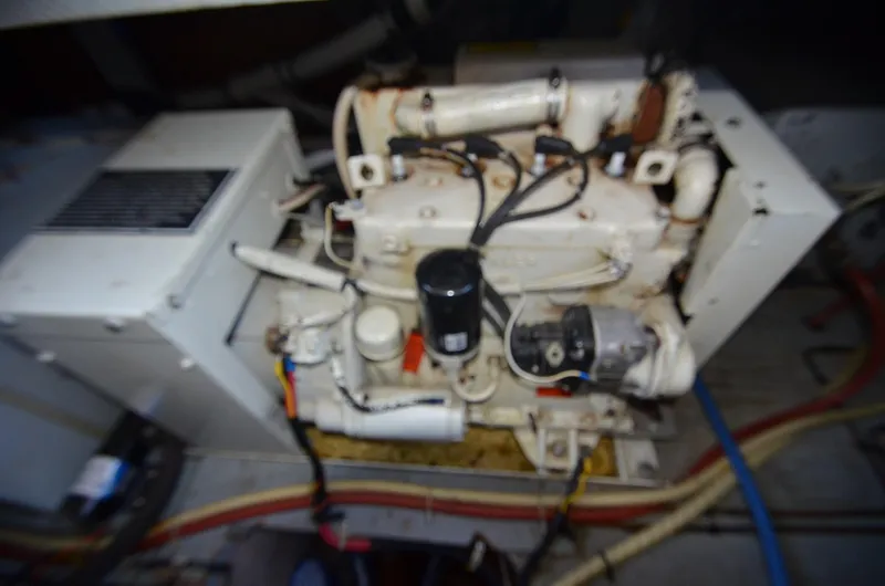 Slide: The Image of Engine compartment of a 1986 Silverton 40 Aft Cabin boat. - 33