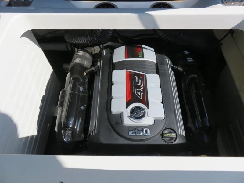 Slide: The Image of Engine compartment of 2022 Sea Ray 21 SPX boat, featuring a 4.5L 250 horsepower engine. - 8