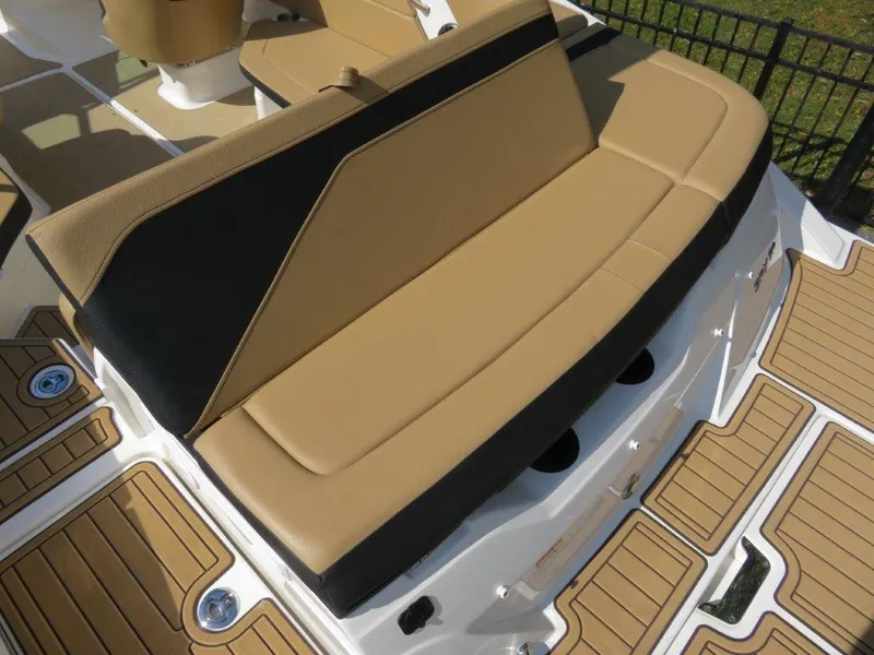 Slide: The Image of 2022 Sea Ray 21 SPX boat with tan and black seating, featuring teak-style flooring. - 9