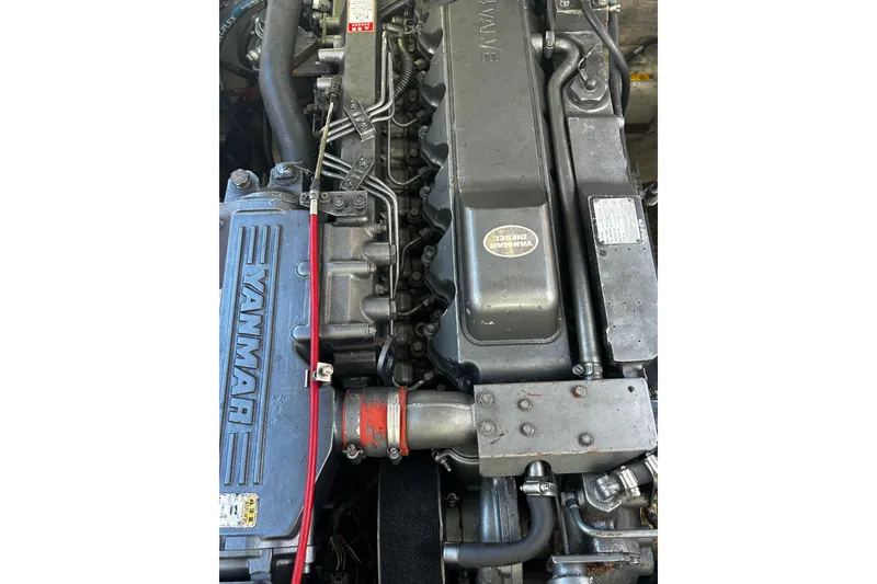 Slide: The Image of Engine of a 2000 Albin 28 Tournament Express with Yanmar diesel components. - 14