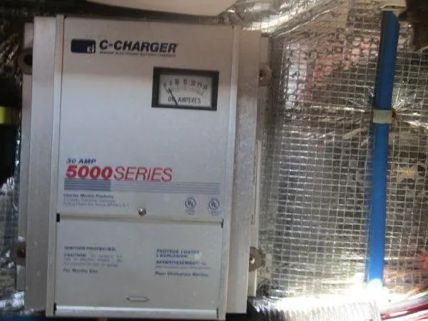 Slide: The Image of C-Charger 5000 Series 30 Amp in 2000 Albin Tournament Express boat. - 34