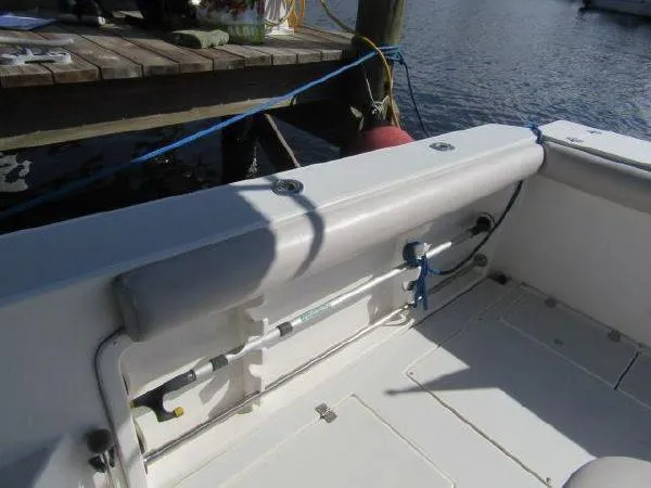 Slide: The Image of 2000 Albin Tournament Express boat interior near dock. - 7