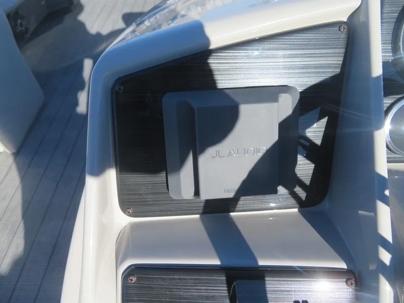 Slide: The Image of 2023 Sylvan Mirage X5 boat dashboard with JL Audio system. - 11