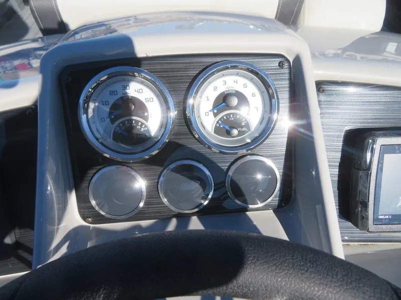 Slide: The Image of 2023 Sylvan Mirage X5 dashboard with gauges and controls. - 9