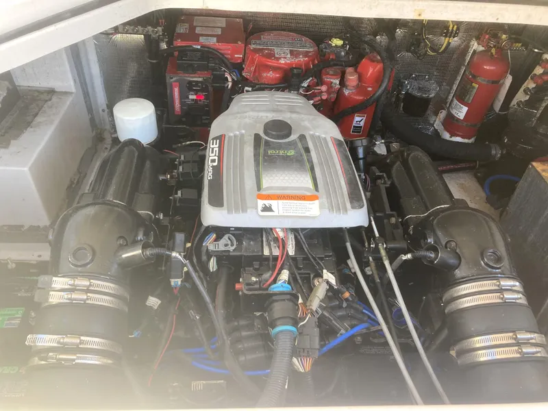 Slide: The Image of 2015 Regal 28 Express engine compartment with Volvo Penta 350 V8 engine. - 8