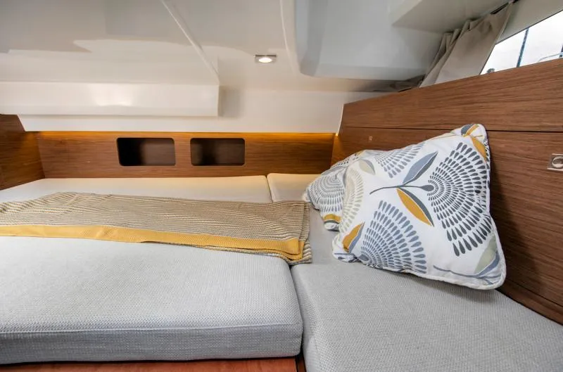 Slide: The Image of Cozy cabin interior of 2025 Jeanneau Leader 9.0 WA S2 with stylish bedding. - 12