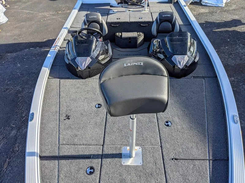 Slide: The Image of 2025 Lund 1875 Pro V Bass boat with dual consoles and fishing seat. - 3