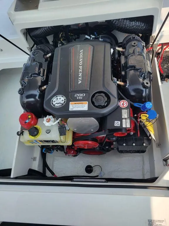 Slide: The Image of 2024 Cobalt CS22 boat engine compartment with Volvo Penta 280 V6 engine. - 17