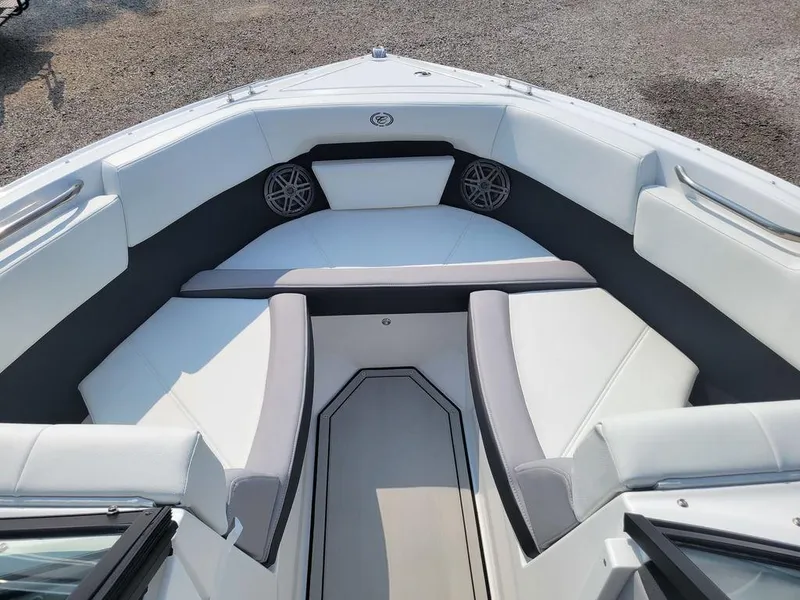 Slide: The Image of 2024 Cobalt CS22 boat interior with white and gray seating. - 4
