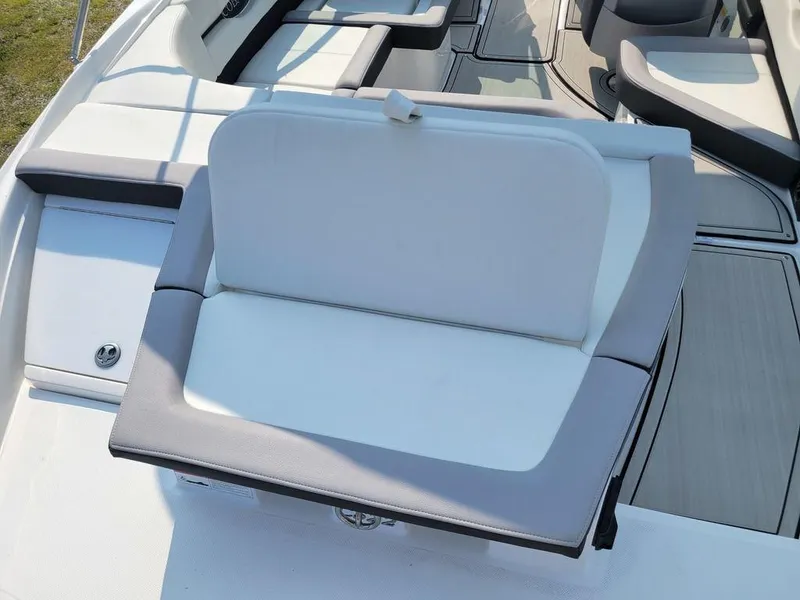 Slide: The Image of 2024 Cobalt CS22 boat with white and gray seating. - 7