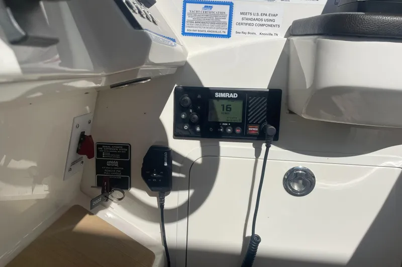 Slide: The Image of Close-up of a Simrad radio on a 2020 Sea Ray Sundancer 320. - 15