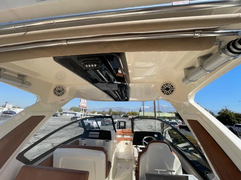 Slide: The Image of Interior view of 2024 Scout 277 Dorado boat with modern design. - 7