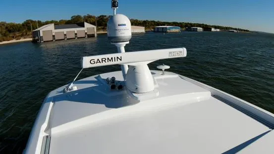 Slide: The Image of 2018 Cruisers Yachts 50 Cantius with Garmin radar on the water. - 13