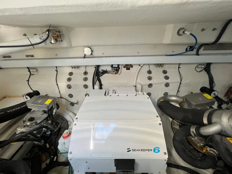 Slide: The Image of Engine room of a 2018 Cruisers Yachts 50 Cantius with Seakeeper 6 stabilizer. - 24