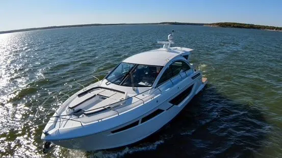 Slide: The Image of 2018 Cruisers Yachts 50 Cantius on open water. - 3